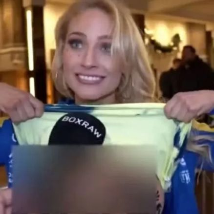 Boxeadora mostra seios e deixa entrevistador atônito